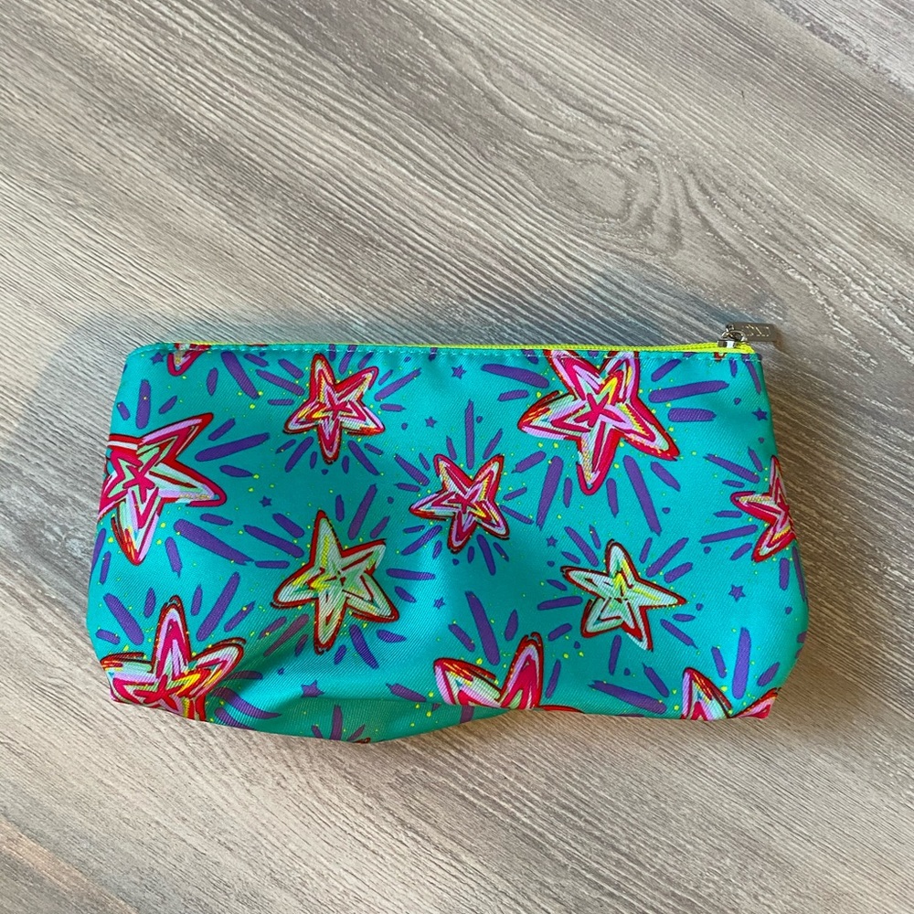 NWOT Clinique star make up bag
